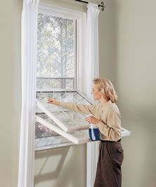 Energy efficient replacement double hung windows easily maintained.